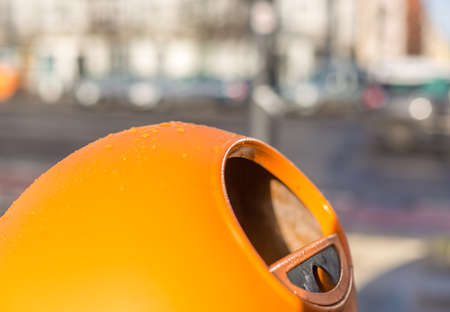orange trash canの写真素材