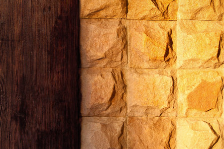 yellow stone wall with wooden stripe 