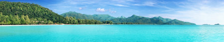 Beautiful tropical Thailand island panoramic with beach, white sea and coconut palms for holiday vacation background conceptの写真素材