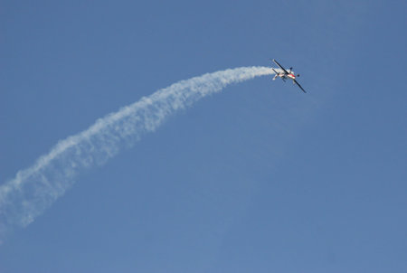 airplane surfing the skyの写真素材