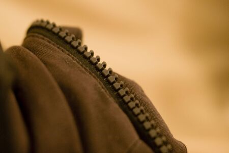 abstract image with  a brown zipperの写真素材