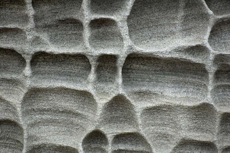 Patterns in the rock caused by erosionの写真素材