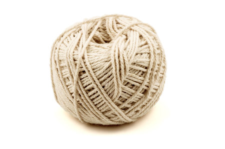 A ball of white string.  Isolated on white.