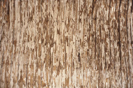 Background image of a peeling and cracked painted wood texture.の写真素材