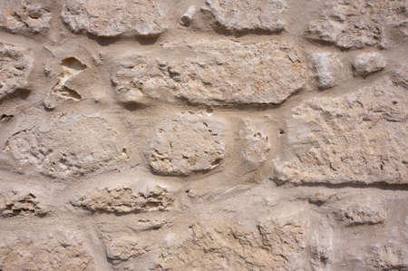 A grey stone wall for use as a background or wallpaper image.の写真素材