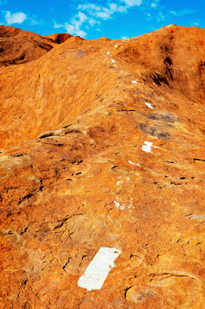 Extreme sport off road track.  White lines designate the trail up rough, stone terrain.