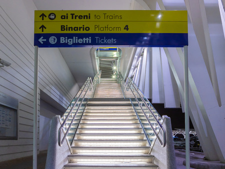 Reggio Emilia, Italy, May 16, 2019: high speed train station Reggio Emilia, stairs to get to the platforms, front.のeditorial素材