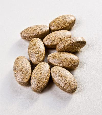 Composition with containers of dietary supplements and capsules
