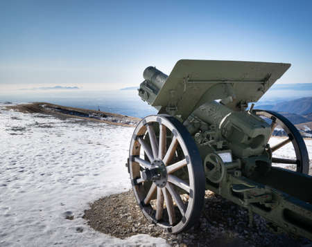 Close up of WWI cannon placed on the Military Shrine of Cima Grappa. This is one of the main military ossuaries of the First World War. Monte Grappa, Veneto, Italyの写真素材