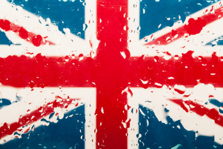 Drops of water on English flag background. Shallow depth of field. Selective focus. Toned