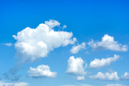White and blue clouds and sky. Natural cloudscape background. Cumulus clouds type
