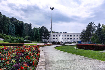 Niska Banja, Serbia - July 02, 2018: Resort park with decorative flower and path for walking and relaxation. Natural and spa concept landscape imageのeditorial素材