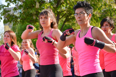 Nis, Serbia - April 20, 2019 Group of female practicing Piloxing outside in park on sunny day on April 20, 2019 in park Sveti Sava, Nis, Serbia, Europeのeditorial素材