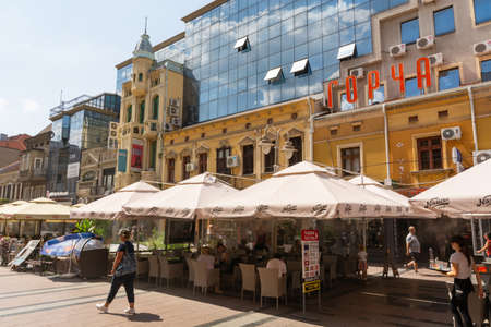 Nis, Serbia - August 28, 2019: Promenade street with cafes and shops with walking people and modern buildings on summer sunny day in the city of Nis, Serbiaのeditorial素材