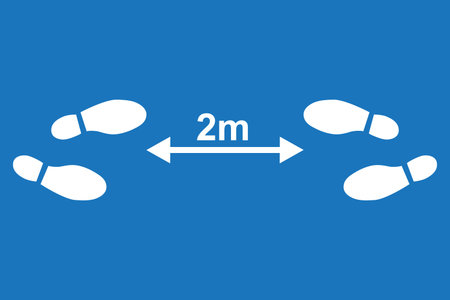 Social distancing icon with two pairs of shoe prints and an arrow line. Keep the 2-meter distance....