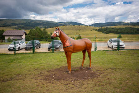 Zlatibor, Vodice, Serbia - July 26. 2020 Indian model of a horse in the city of El Paso in wild west style and cowboy style. Western thematic park. Travel conceptのeditorial素材