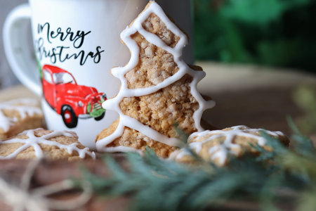 Christmas tree retro cookie on a decorated desk at home. Christmas and homemade food decoration...