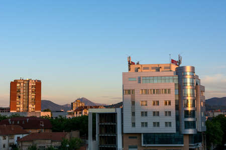 Nis, Serbia - September 07, 2021 Skyline in the sunset of the city of Nis with a view of the buildings on an autumn dayのeditorial素材