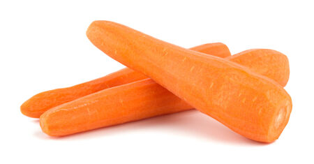 Peeled fresh carrots isolated on white backgroundの写真素材