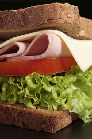 Closeup of a sandwich on black backgroundの写真素材