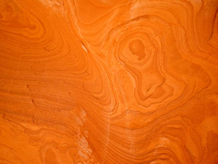 Strange shapes and faces appear in sandstone rockの写真素材