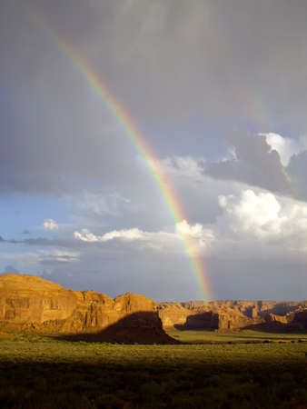 Double rainbows appear after sudden desert stormの写真素材