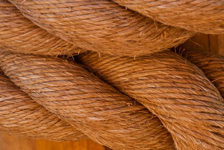 Large fiber rope tied up in knotsの写真素材