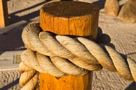 Large rope plaited on a postの写真素材