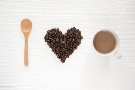 I love coffee, coffee beans and mug on wood backgroundの写真素材