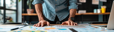 cropped view of businessman working with financial charts in office, bannerの素材