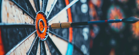 Dartboard with arrow on the target. Close-up.の素材
