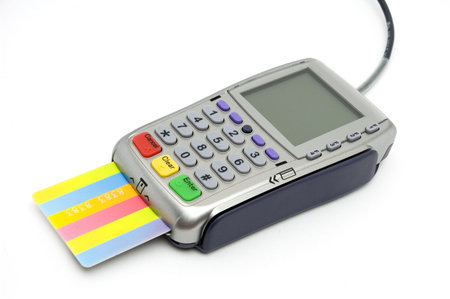 Modern POS terminal with credit card inserted