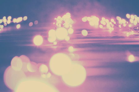 Blurred of car in city at night,vintage color toneの写真素材