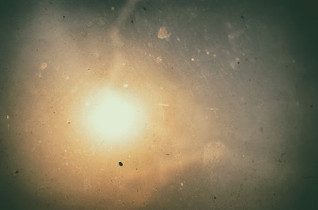 abstract of sun on dirty glass with filter effect retro vintage styleの写真素材