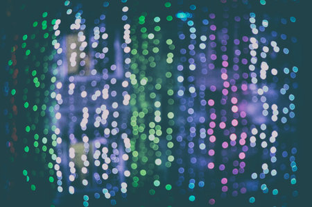 Abstract circular bokeh background of Christmaslight. Toned.の写真素材