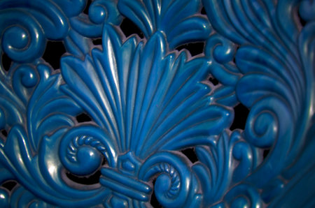 Close up of blue ceramic pottery on display in a shop windowの写真素材