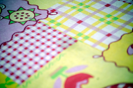 abstract background from a fabric with a pattern of yellow and greenの写真素材