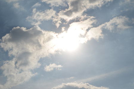 Blue sky with clouds and sun. The vast blue sky and clouds sky on sunny day.の写真素材