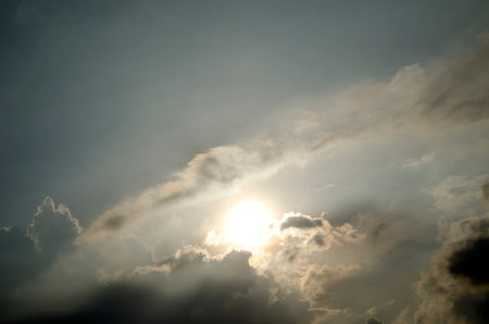 Cloudscape has been developing in gorgeous form. The sun is shining through the clouds.の写真素材