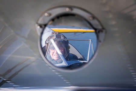 Old Pilot Flies Airplaneのeditorial素材