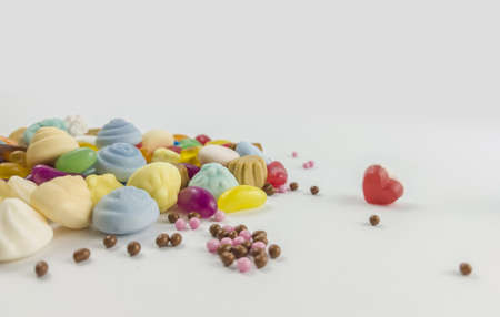 Multicolored candies on a white background. Sweets for Valentine's Day.の写真素材