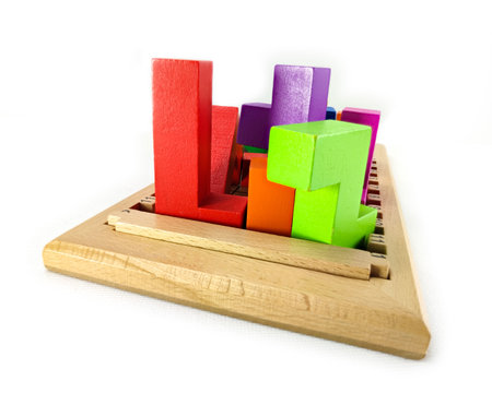 Colorful wooden blocks on a white background.