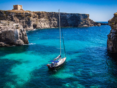 Boat sails off Comino Island, Gozo Malta