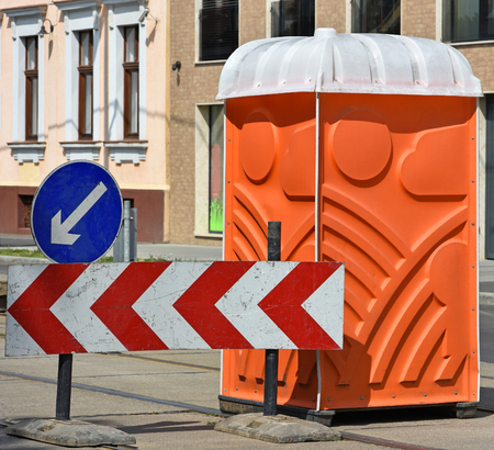 Portable toilet at the road construction in the cityの写真素材