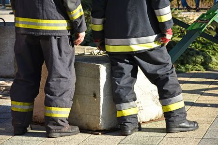 Firefighters are waiting outdoorの写真素材