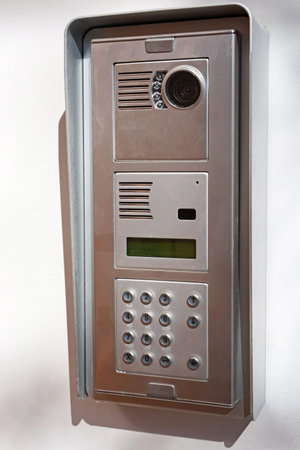 Intecom next to the door of a building
