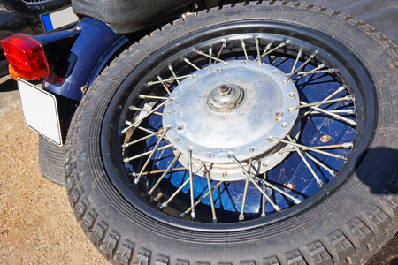 Spare tire of an old sidecar motorcycleの写真素材