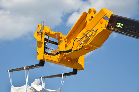 Hydraulic forklift against sky