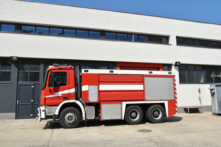 Firefighter vehicle next to the fire station
