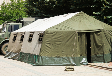 Military tent and truck outdoorsの写真素材